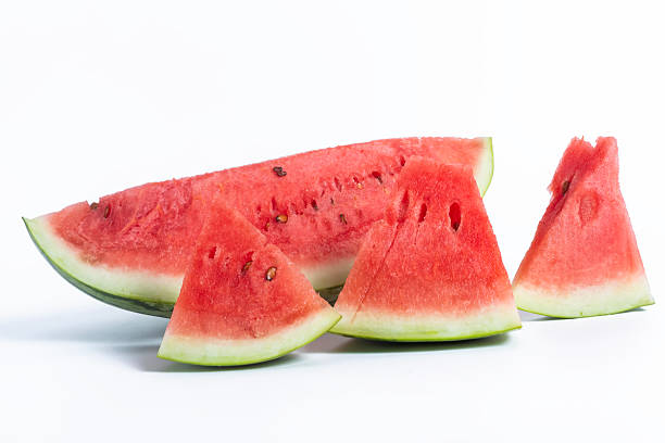 istock Freshly cut watermelon slices on a white background, closeup 2213244793
