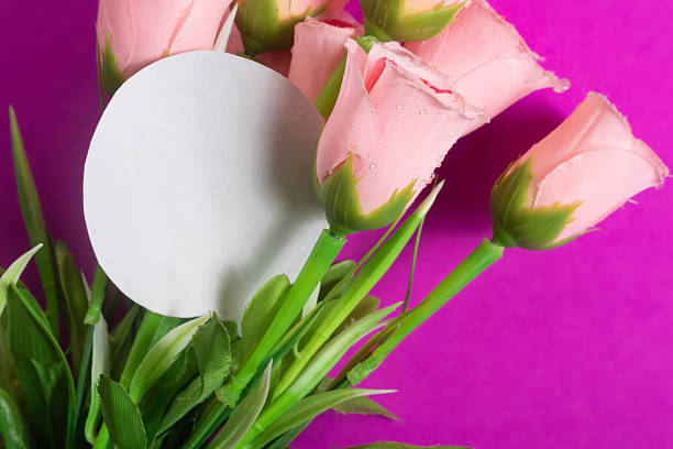 Bouquet with roses, gypsophila, chrysanthemum, hydrangea with empty greeting card.