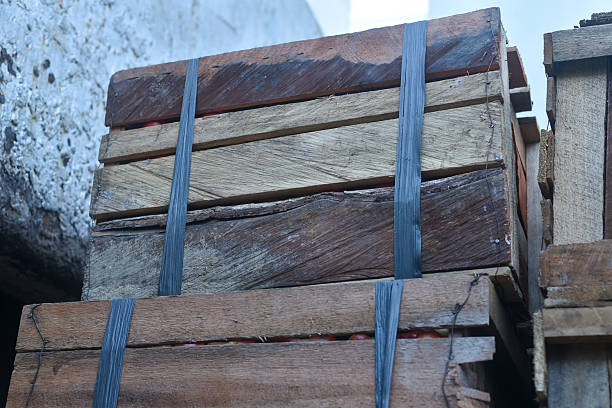 pile of used wooden boxes