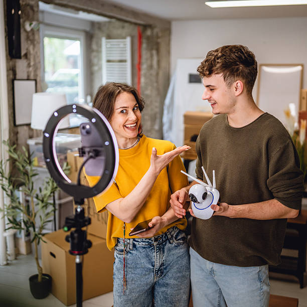 istock man and woman record video how to connect cctv security camera 2213251552