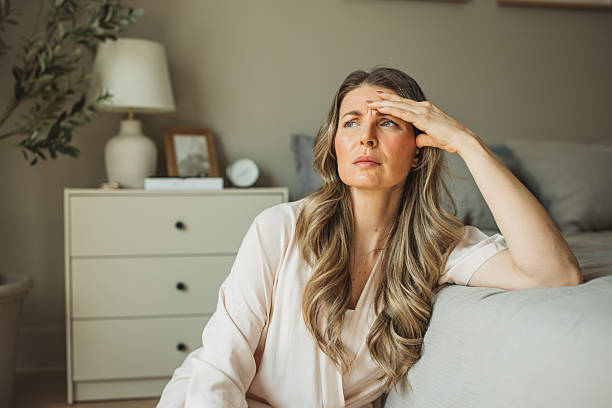 Mature woman having headache