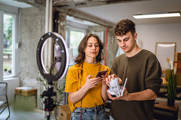 istock man and woman record video how to connect cctv security camera 2213251923