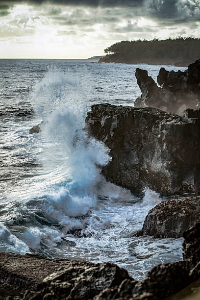 istock Wave Crashing Against Lava Rock 3 2213255985