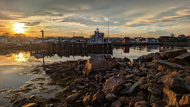 istock Rockport Harbor Massachusetts at sunset 2213258396