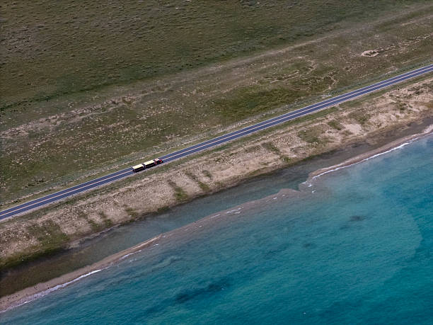 istock Aerial View of Train Tracks Alongside 2213262837