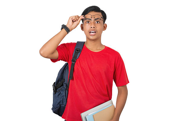 istock Young asian collage student looking forward with a surprised expression isolated on white background 2213267845