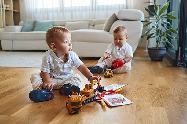 istock Playful twin baby boys 2213289655