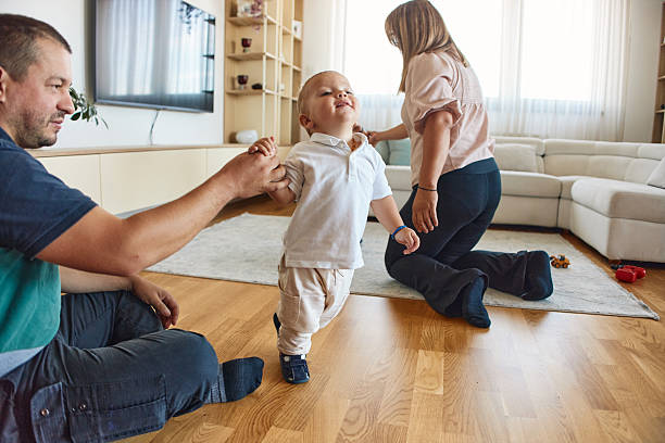 istock First steps of our baby 2213289723