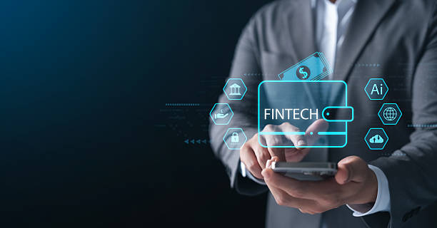 istock Businessman using mobile phone with virtual fintech interface, showing digital wallet, AI, security, and finance icons, concept of financial technology, innovation, and secure payment system. 2213296964