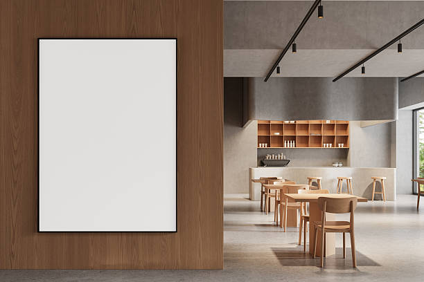 istock Blank poster mockup in modern wooden wall inside minimalist cafe interior with light furniture and clean design concept for creative display template. 3D Rendering 2213299985