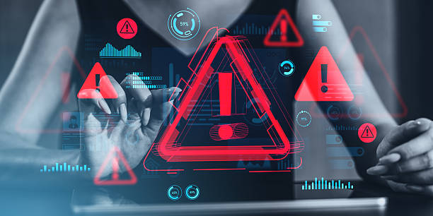 istock Cybersecurity warning concept with red alert icons and data graphics on transparent futuristic screen interface over digital background. 2213300550