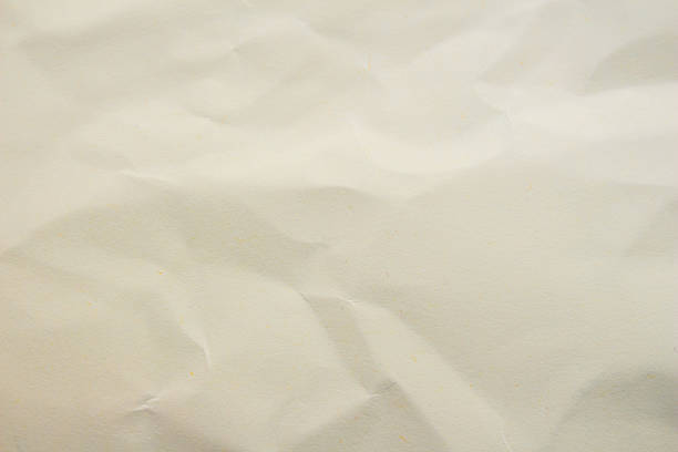 istock Crumpled paper as background creased craft paper texture design element 2213303650