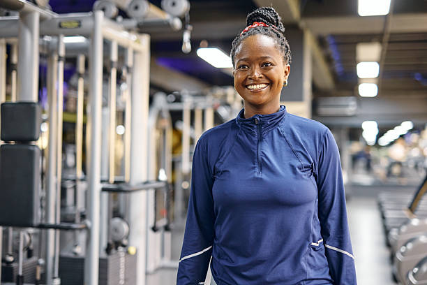istock Confident woman smiling in the gym after training 2213307242