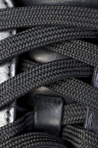 istock black synthetic laces for tying shoes 2213315581