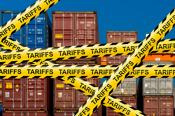 istock Tariff Warning Tape at Shipping Port 2213319581