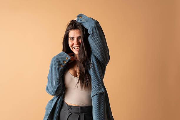 istock Young woman joyfully expressing happiness 2213319972