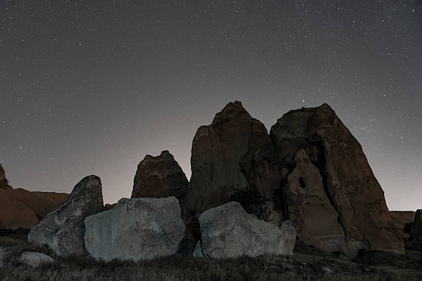Stars over Rock Formations in Cappadocia, Nevsehir City, Turkiye