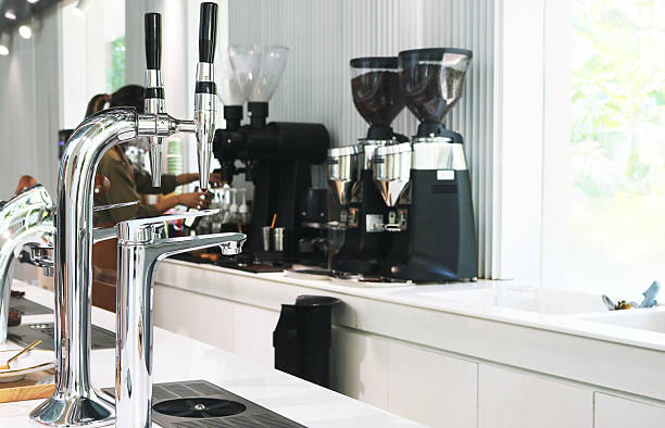 istock Double head coffee machine with sink faucet. 2213321698