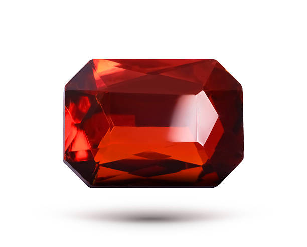istock Red shiny gemstone in air on white background 2213322039