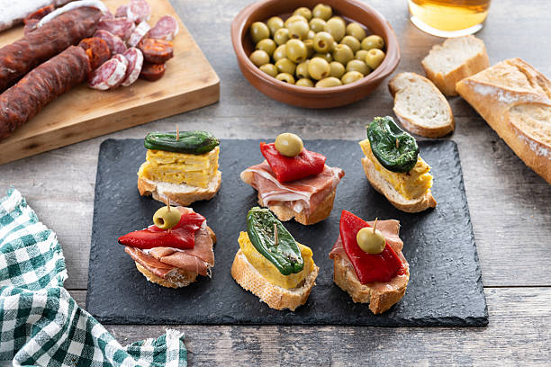 istock Traditional Spanish pintxos on wooden table 2213322132