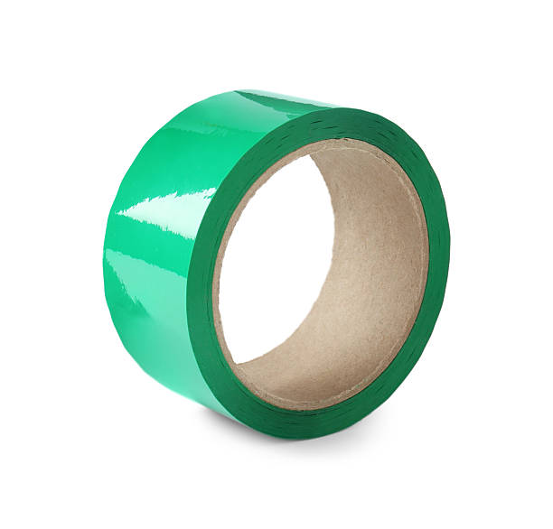 istock Roll of green adhesive tape isolated on white 2213322174