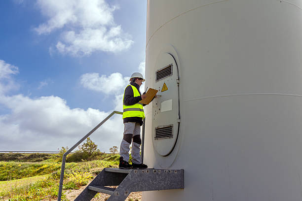 istock Female engineer inspecting a wind turbine for renewable energy 2213322723