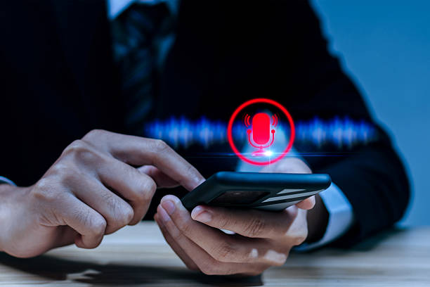 istock Speech Recognition. business people hand touching microphone icon on mobile smart phone, voice recording, telemarketing, voice control, artificial intelligence, internet network technology concept 2213322978