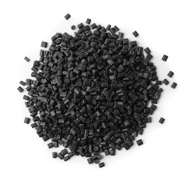 istock Pile of black plastic granules isolated on white, top view 2213324852