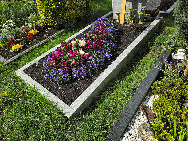 Flowers on the tombstones in the public cemetery