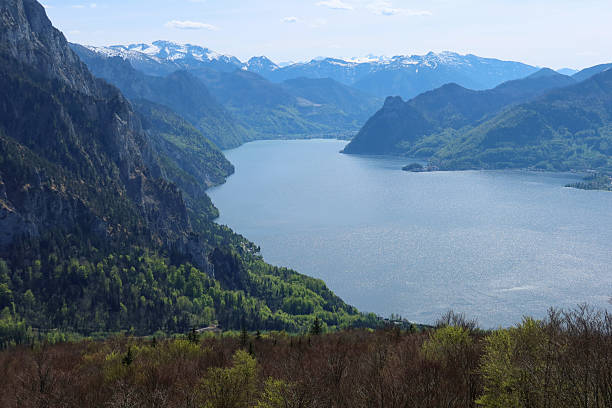Traunsee rests quietly among the Austrian Alps, its clear waters and mountainous surroundings offering a perfect scene of natural harmony.