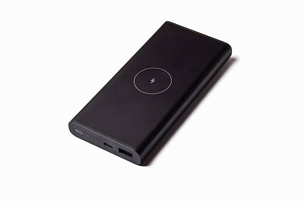 istock A black wireless power bank is displayed against a clean white backdrop, highlighting its sleek design and modern charging capabilities. 2213331326