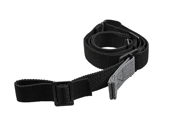 istock Black adjustable shoulder strap with D-rings, suitable for bags or gear, isolated on white background. 2213331355