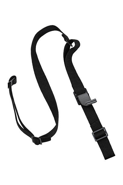 istock Black adjustable shoulder strap with D-rings, suitable for bags or gear, isolated on white background. 2213331359