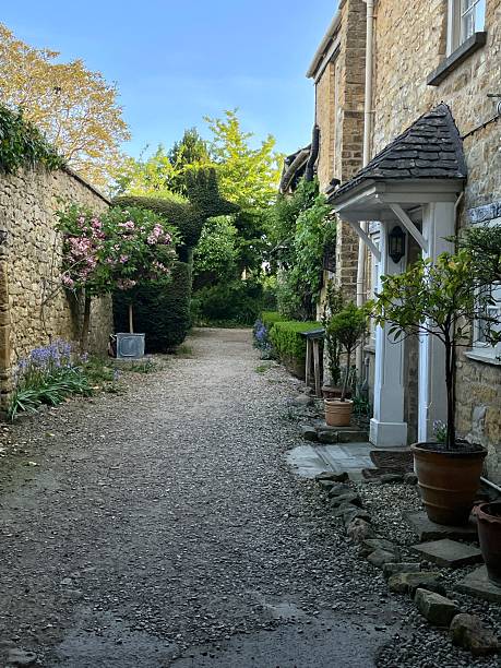 istock Topiary In A Back Alley, Broadway, Worcestershire, England 2213336072