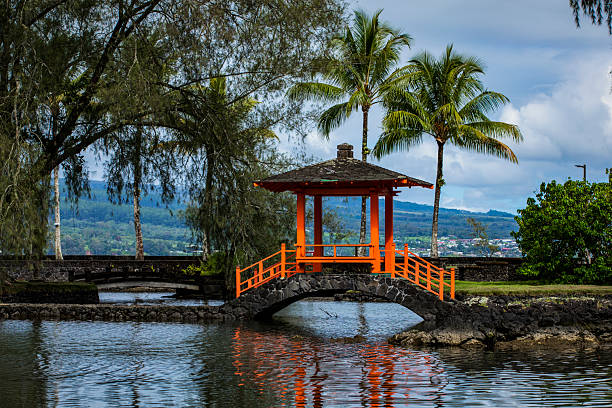 Orange footbridge and pavilion, iconic structure located in Hilo, Hawaii in Liliuokalani Gardens on Hilo Bay.