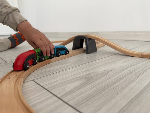 istock The boy playing with the train 2213351052