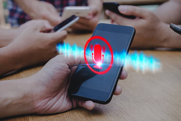 istock Speech Recognition. business people hand touching microphone icon on mobile smart phone, voice recording, telemarketing, voice control, artificial intelligence, internet network technology concept 2213352013