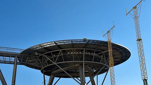 istock A Stunning Futuristic Structure Set Against a Bright Clear Sky with Brilliant Blue Hues 2213353208