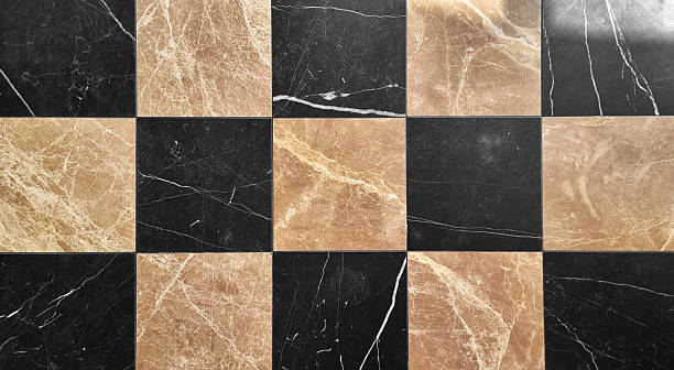 istock polished checkerboard pattern of alternating Emperador Light and dark marble tiles, square shape tiles, creating an elegant. 2213356880