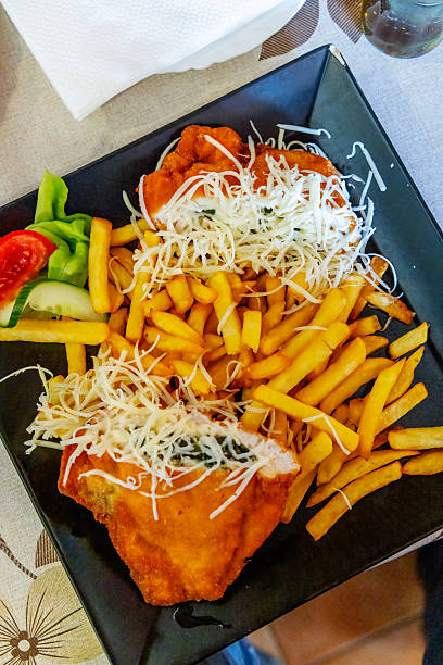 istock cordon bleu with french fries 2213358730