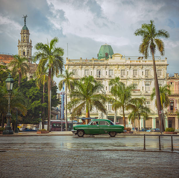 Retro stylized view of Paseo del Prado - street in Havana Vieha, Cuba. The Tower belongs to a building of Grand Theater of Havana