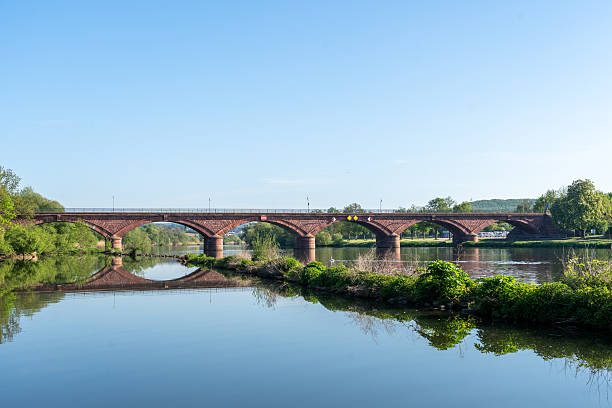 istock Historic bridge over river Main at lower franconia 2213368715