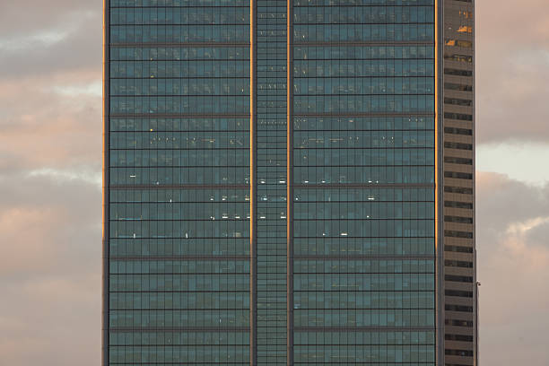 Close up view inside city buildings at twilight with sky