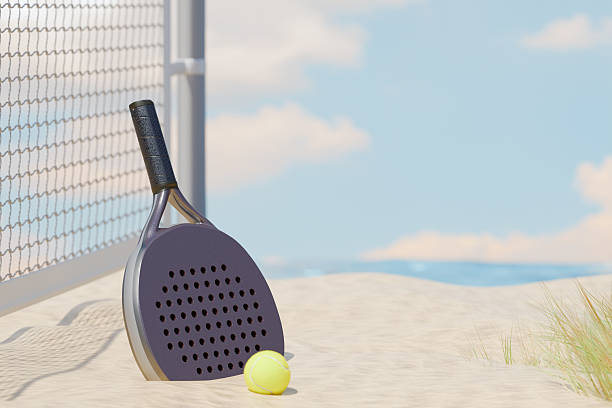 istock Beach padel tennis racket and ball by the shore. 3d rendering 2213375692