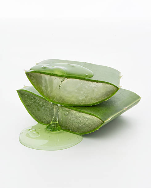 istock Aloe pieces with green gel on white background 2213376151