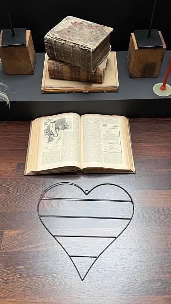 istock In a library, Working with a book from 1892 2213378381