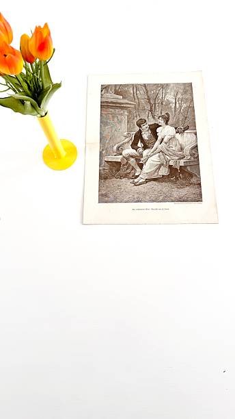 istock In a library, Working with an illustration from 1892, couple on a bench short before the yes for marriage 2213378676