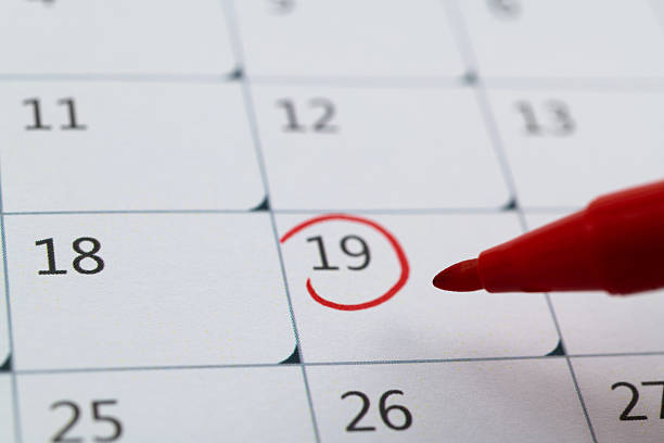 Red mark on the calendar at number 19.