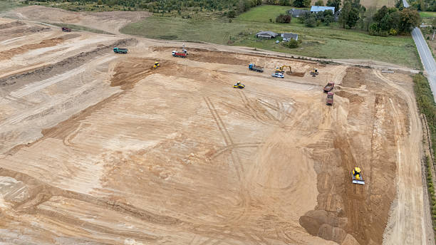 istock Aerial View of Construction Site with Heavy Machinery 2213383664