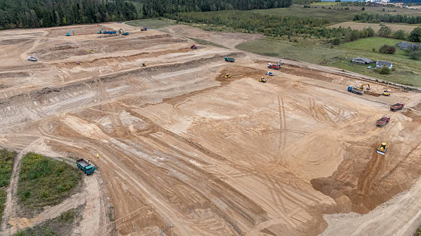 istock Aerial View of Construction Site with Heavy Machinery 2213384557